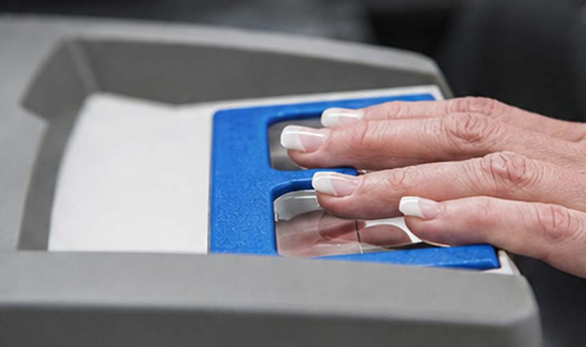 Image of a hand on a Digital Fingerprinting Reader